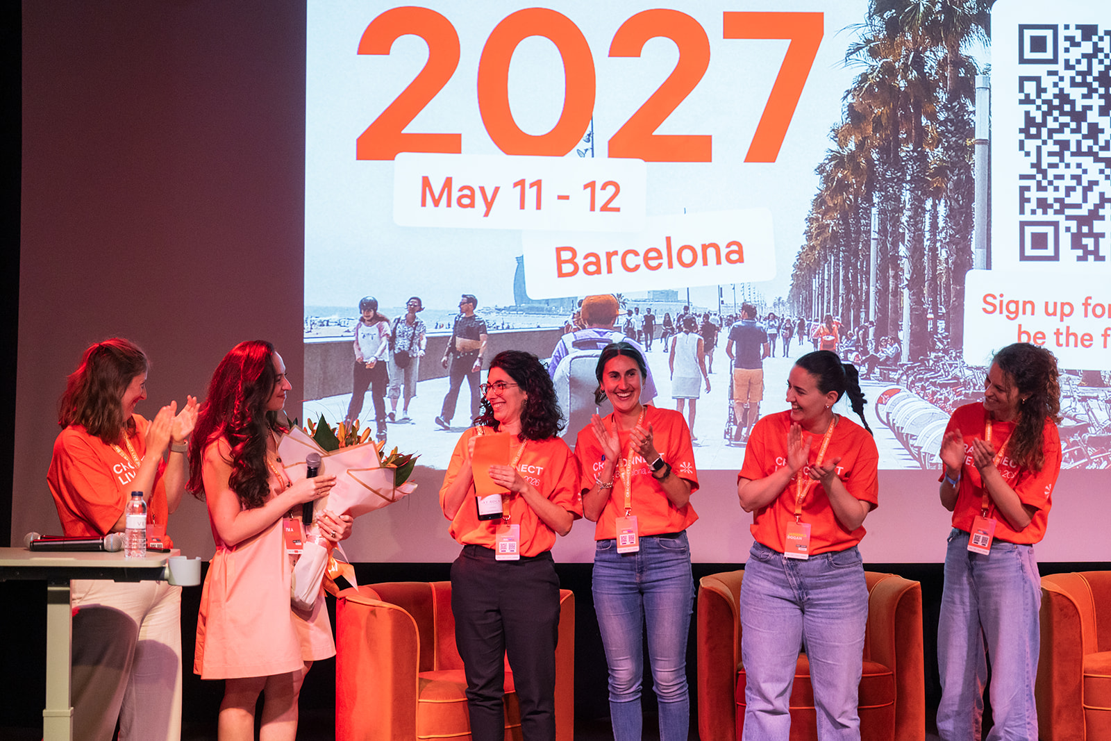 The CRACONNECT team on stage announcing CRACONNECT LIVE 2027 in Barcelona